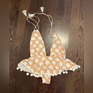 One Piece Bathing Suit size XL but fits more like a M/L. Smoke free.